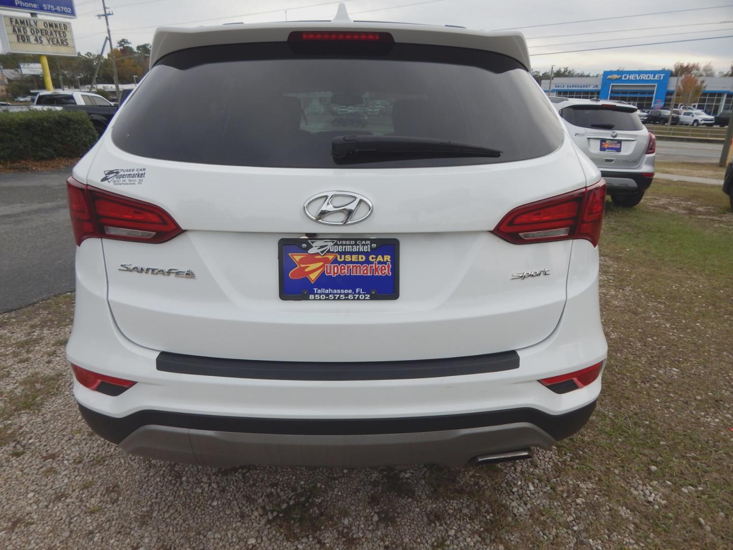 2017 White /Gray Hyundai Santa Fe Sport (5NMZU3LB8HH) with an 2.4L engine, Automatic transmission, located at 3120 W Tennessee St, Tallahassee, FL, 32304-1002, (850) 575-6702, 30.458841, -84.349648 - Used Car Supermarket is proud to present you with this loaded immaculate 2017 Hyundai Santa Fe Sport with low miles. Used Car Supermarket prides itself in offering you the finest pre-owned vehicle in Tallahassee. Used Car Supermarket has been locally family owned and operated for over 48 years. Our - Photo#3